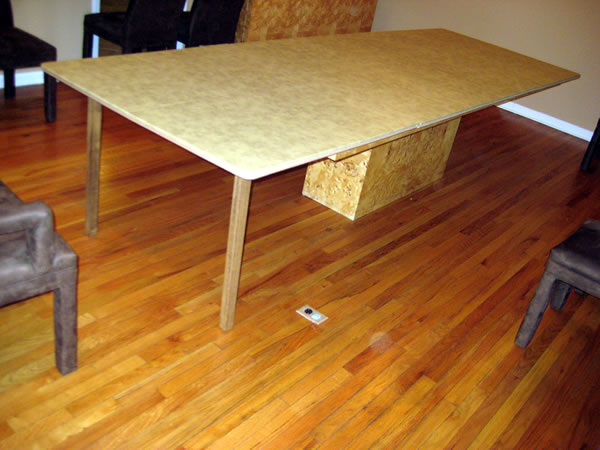 Ben's table extended only at one end Ben's table extended only at one end